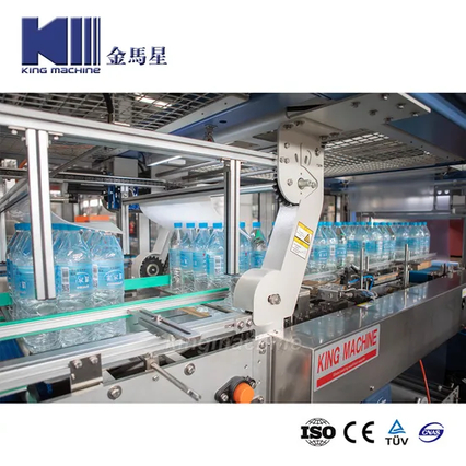 Máquina de envoltura encogida para botellas de plástico / máquina de embalaje con una bandeja